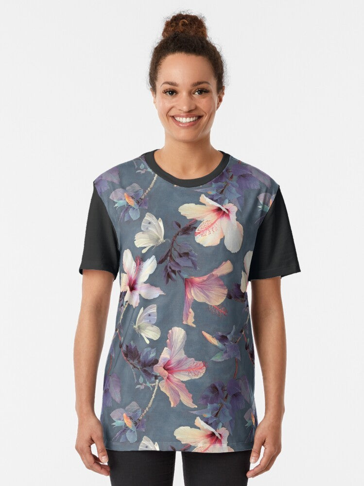 Vibrant painted pattern with hibiscus flowers and butterflies on a graphic t-shirt - Women