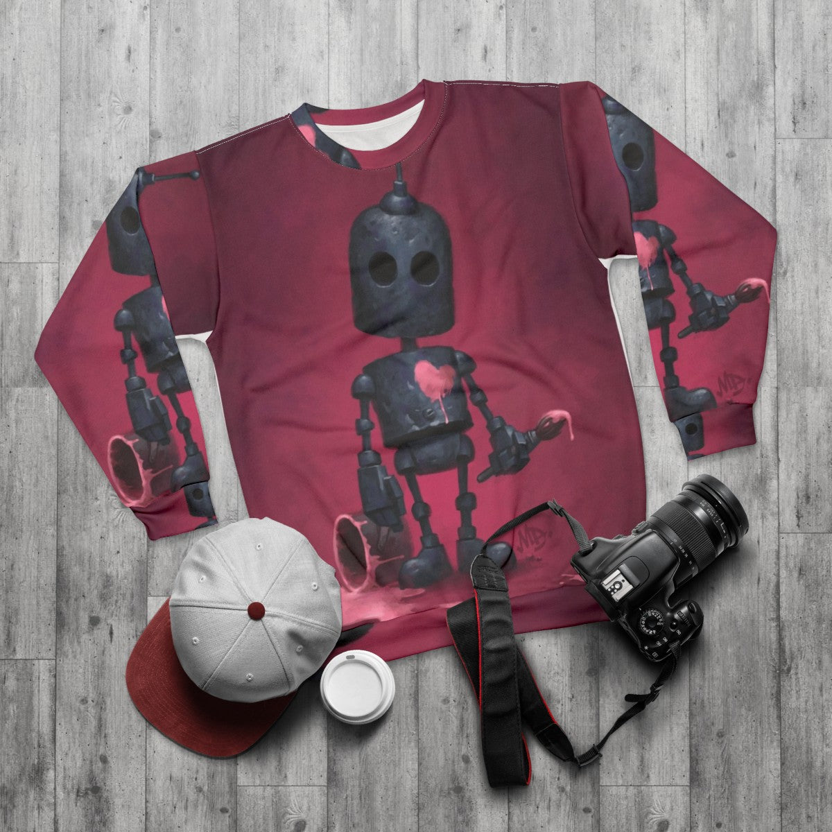 Heartbroken artist robot graphic on pink sweatshirt - flat lay