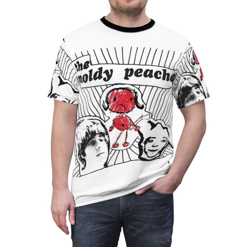 Artistic graphic design featuring the Moldy Peaches indie music band logo on a high-quality t-shirt - men front