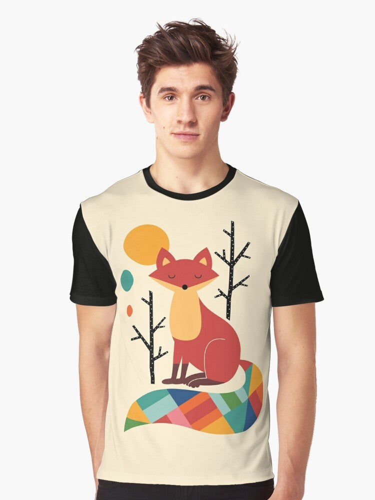 A colorful graphic t-shirt featuring a vibrant rainbow fox in a natural forest landscape. - Men