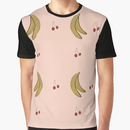 LA PETITE VIE graphic t-shirt featuring a colorful pattern of bananas, cherries, and other Quebec-inspired elements