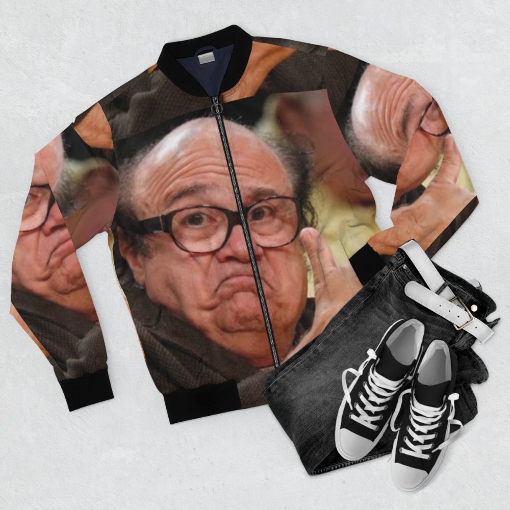 Danny Devito in a bomber jacket, smiling and approving the design - Flat lay