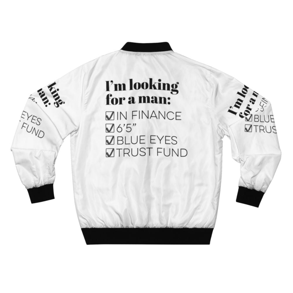 A blue bomber jacket with the text "I'm looking for a man in finance" on it, representing the TikTok song and humor for single people. - Back