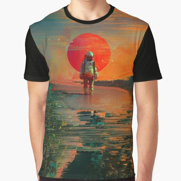 A surreal, visually striking graphic t-shirt featuring an astronaut in a collage-style space scene with planets, stars, and a cosmic blast.