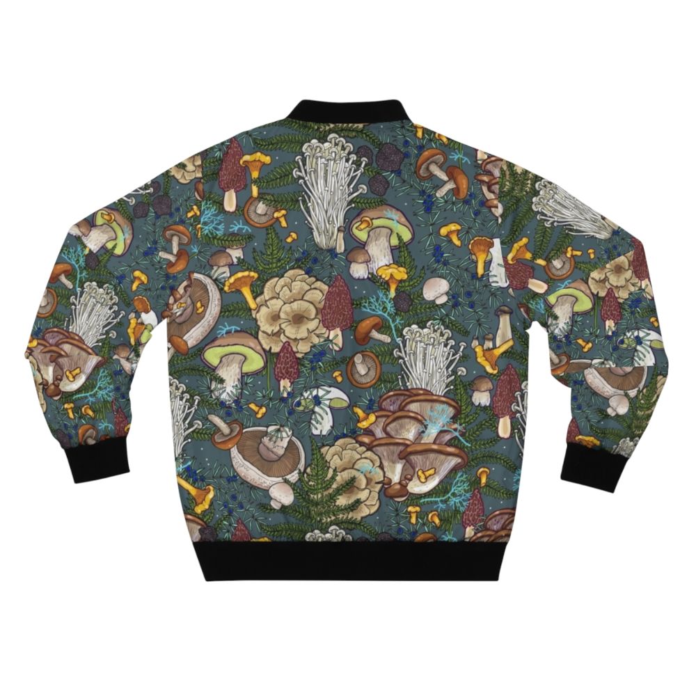 A bomber jacket featuring a pattern of various mushrooms and foliage in a forest setting. - Back