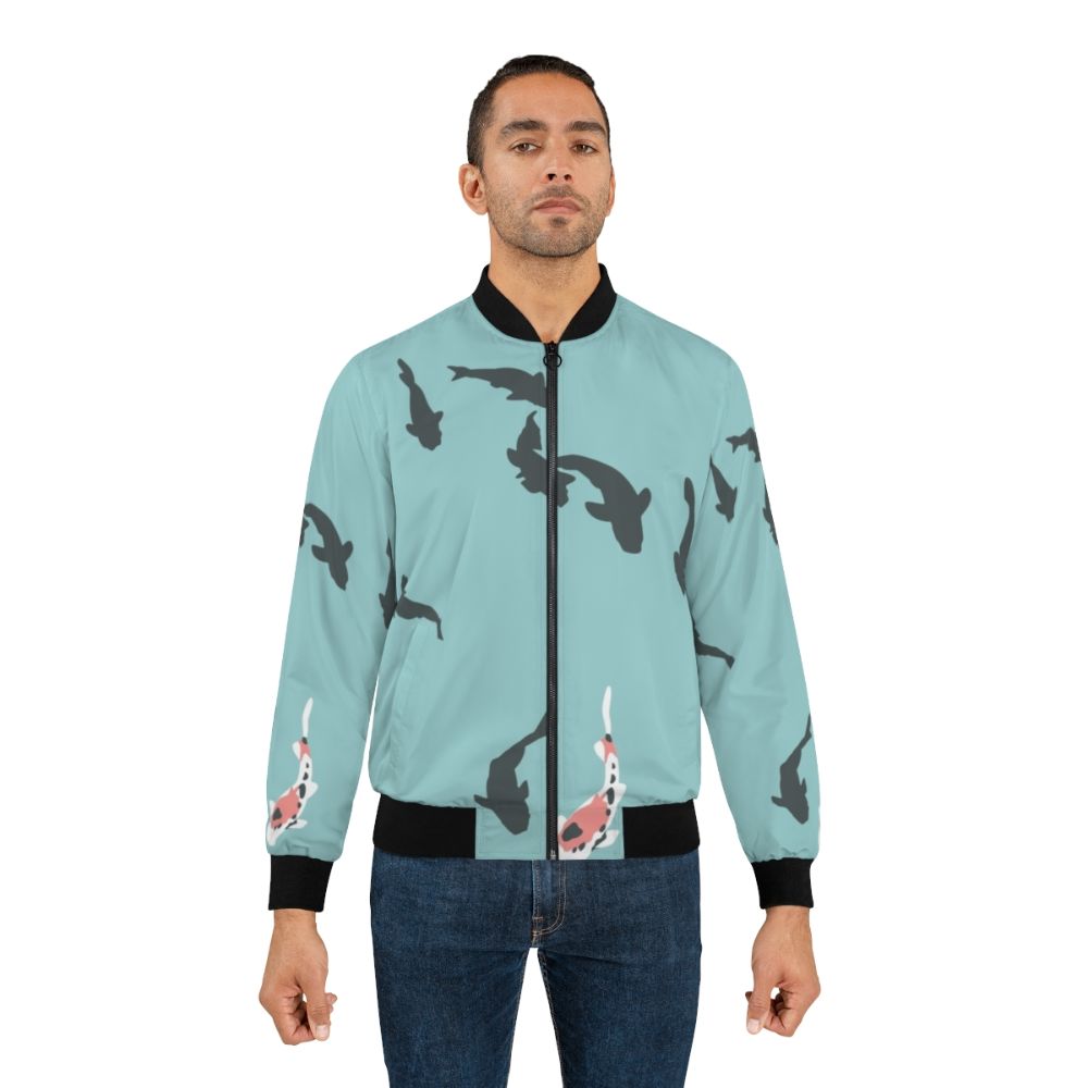 A bomber jacket featuring a minimalist koi fish design inspired by the anime "A Silent Voice" - Lifestyle