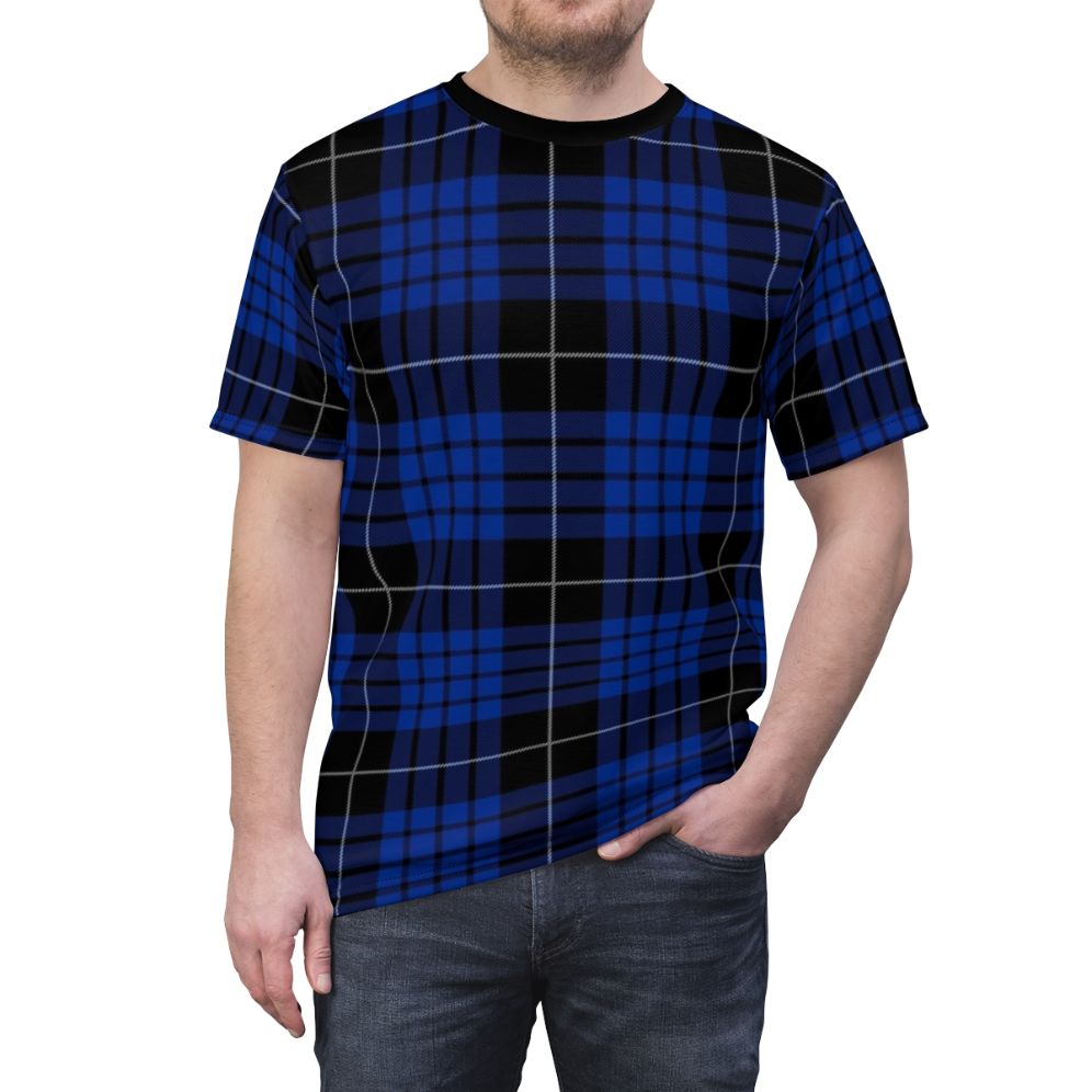 Model wearing a blue and black tartan plaid t-shirt with the Clan Macqueen tartan pattern - men front