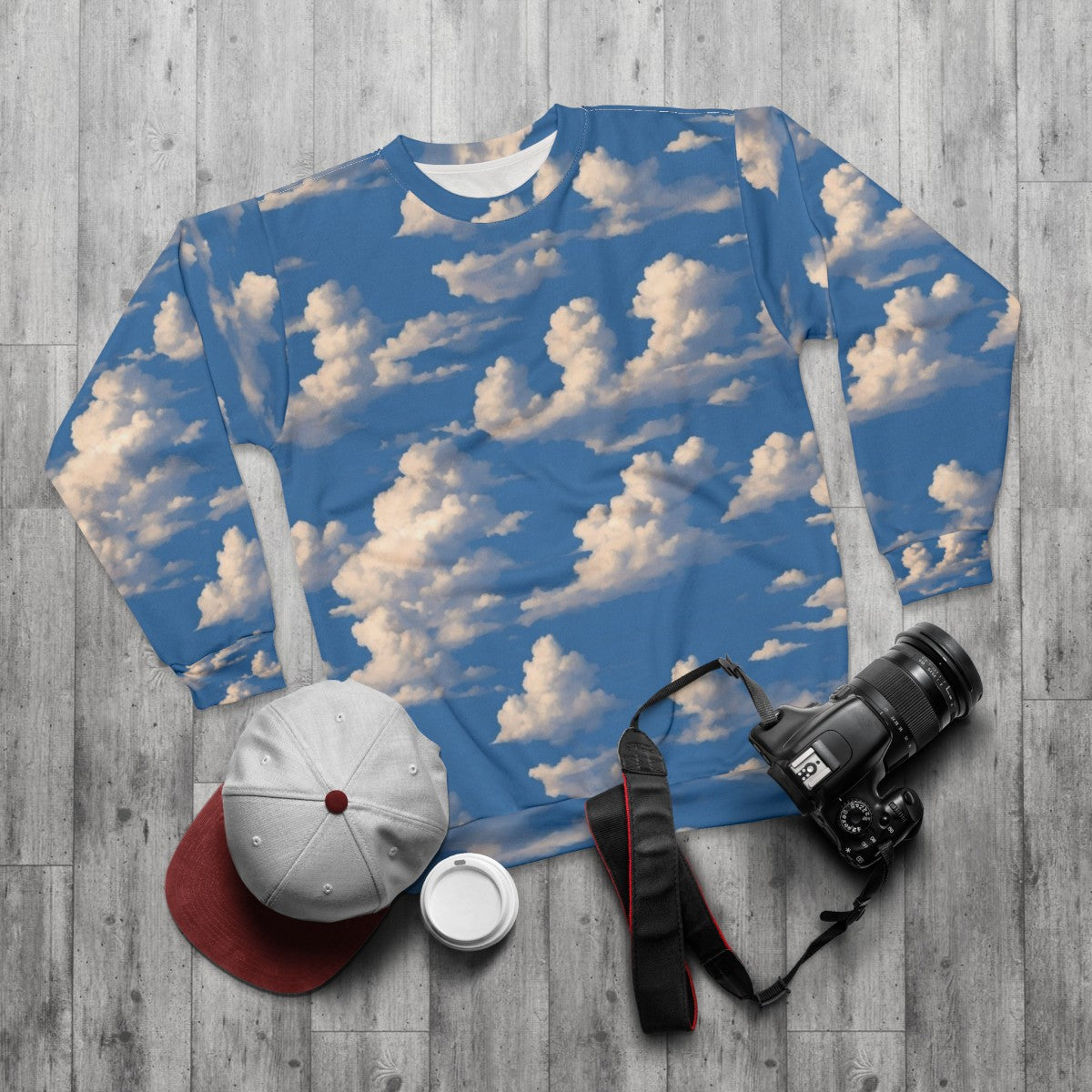 Cloudy sky sweatshirt with nature landscape design - flat lay