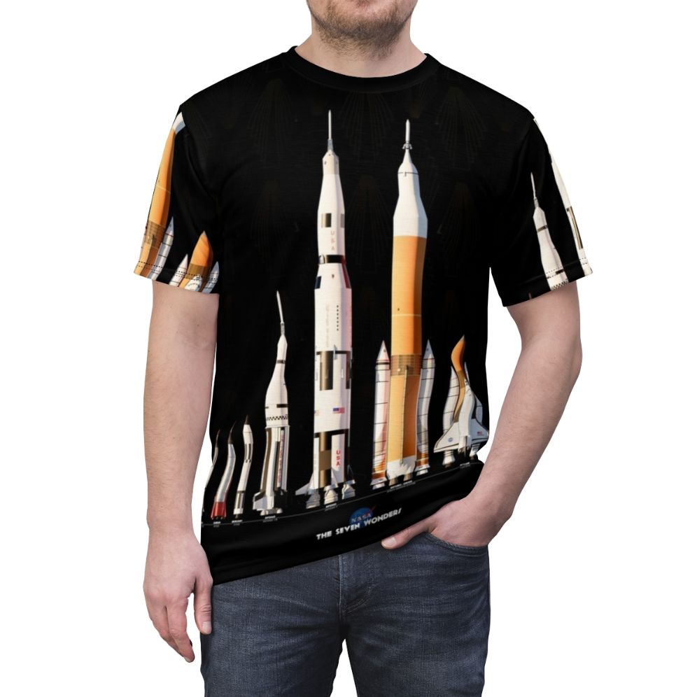 Black t-shirt with a graphic design featuring various NASA rockets and spacecraft on a dark background - men front