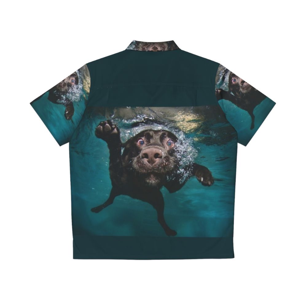 Cute dog wearing a Hawaiian shirt swimming underwater - Back