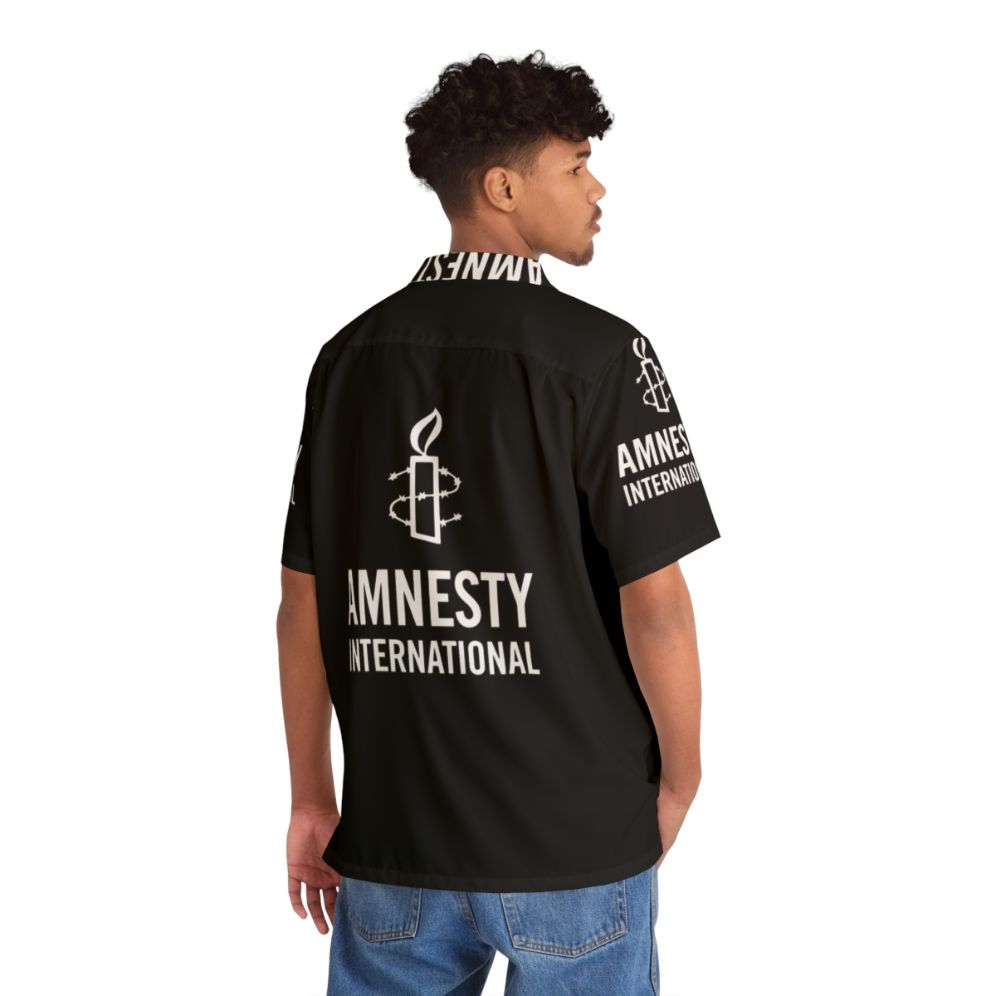 Amnesty International Hawaiian Shirt featuring human rights and social justice - Flat lay