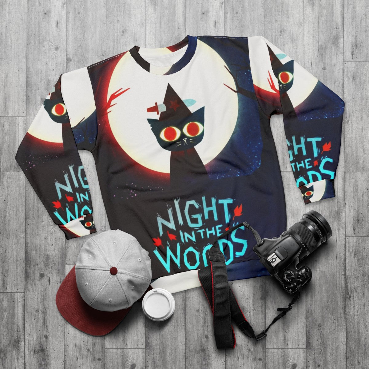 Witch Dagger Sweatshirt inspired by the video game Night in the Woods - flat lay