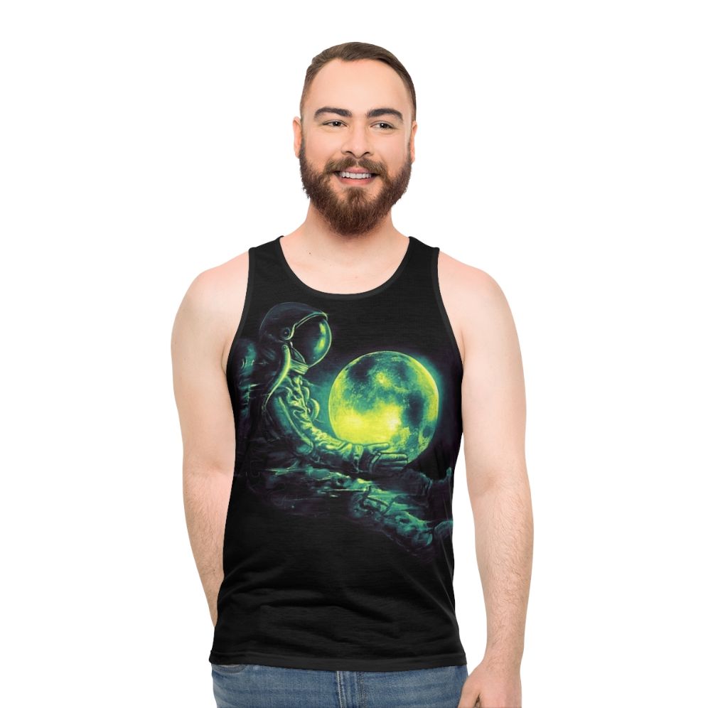 Unisex tank top with a cosmic, galactic design featuring a moon and astronaut - men