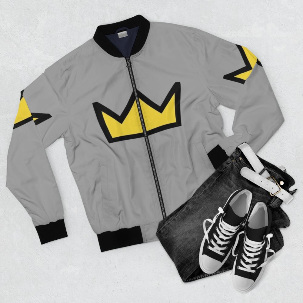 Bughead Betty Cooper Crown Bomber Jacket featuring a graphic design with a crown and the Riverdale TV series theme. - Flat lay