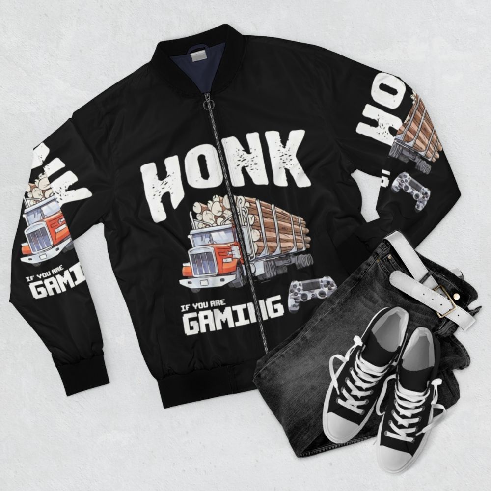 Bomber jacket with "HONK IF YOU ARE GAMING" (Trucker Gamer) design for gamers and fans of ColdOnes, MaxMoeFoe, Anything4Views - Flat lay