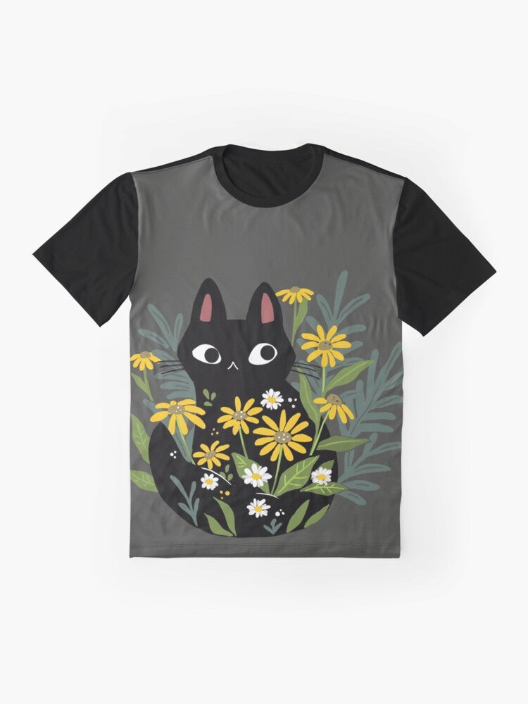 A charming graphic t-shirt featuring a black cat surrounded by vibrant flowers, creating a whimsical and nature-inspired design. - Flat lay