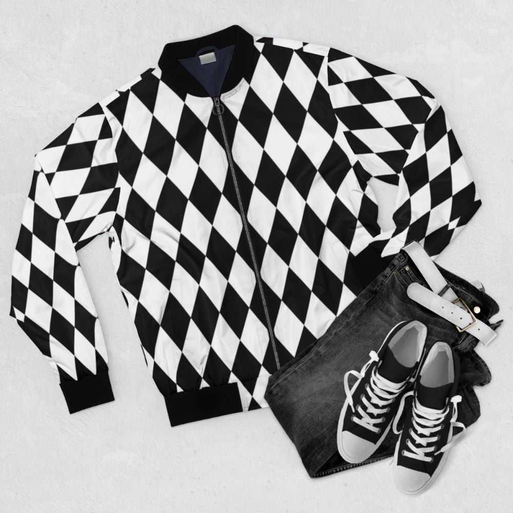 Harlequin diamond pattern bomber jacket in black and white - Flat lay