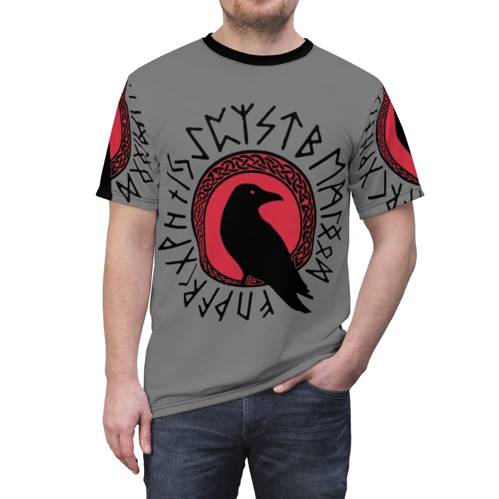 Viking raven graphic on a black and red t-shirt with futhark runes and celtic knot design - men front