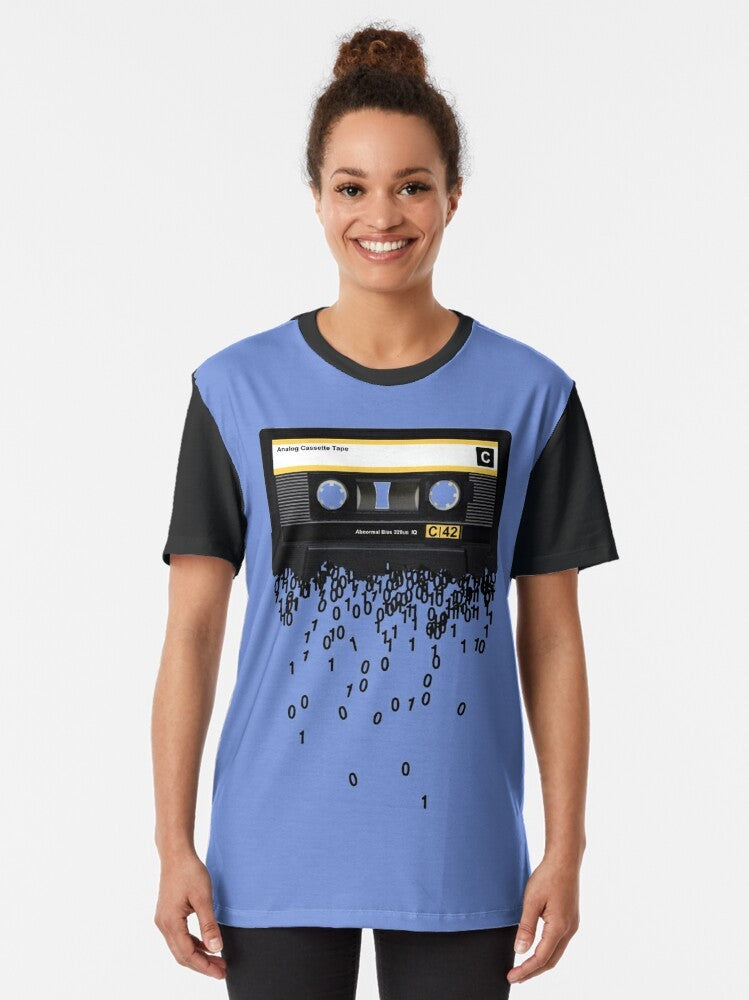 Vintage graphic t-shirt depicting the death of the cassette tape, featuring a retro cassette player and the text "The death of the cassette tape." - Women