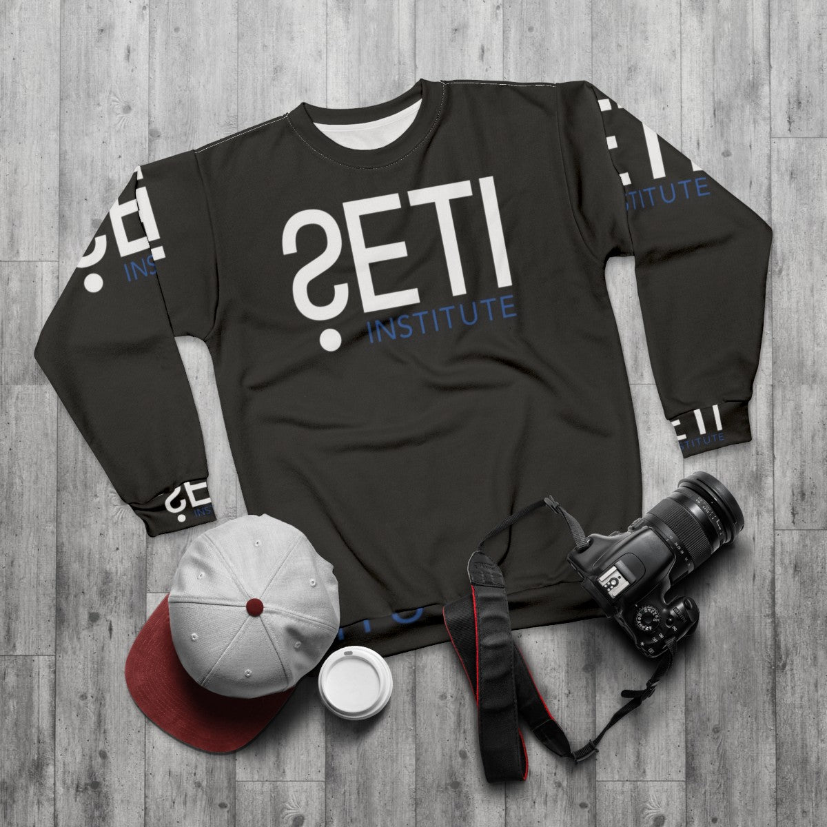 SETI Institute Sweatshirt featuring the SETI logo and space-themed graphics - flat lay