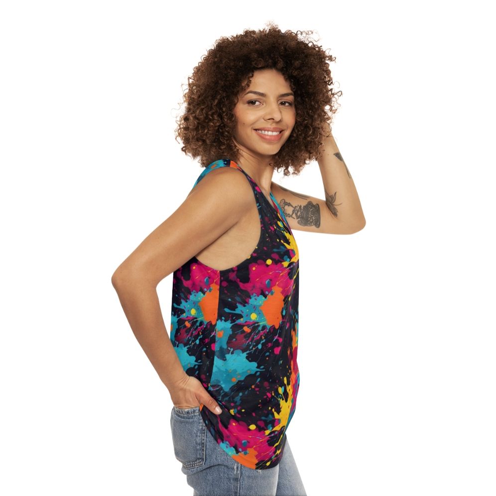 Colorful paint splatter design on a unisex tank top - women side