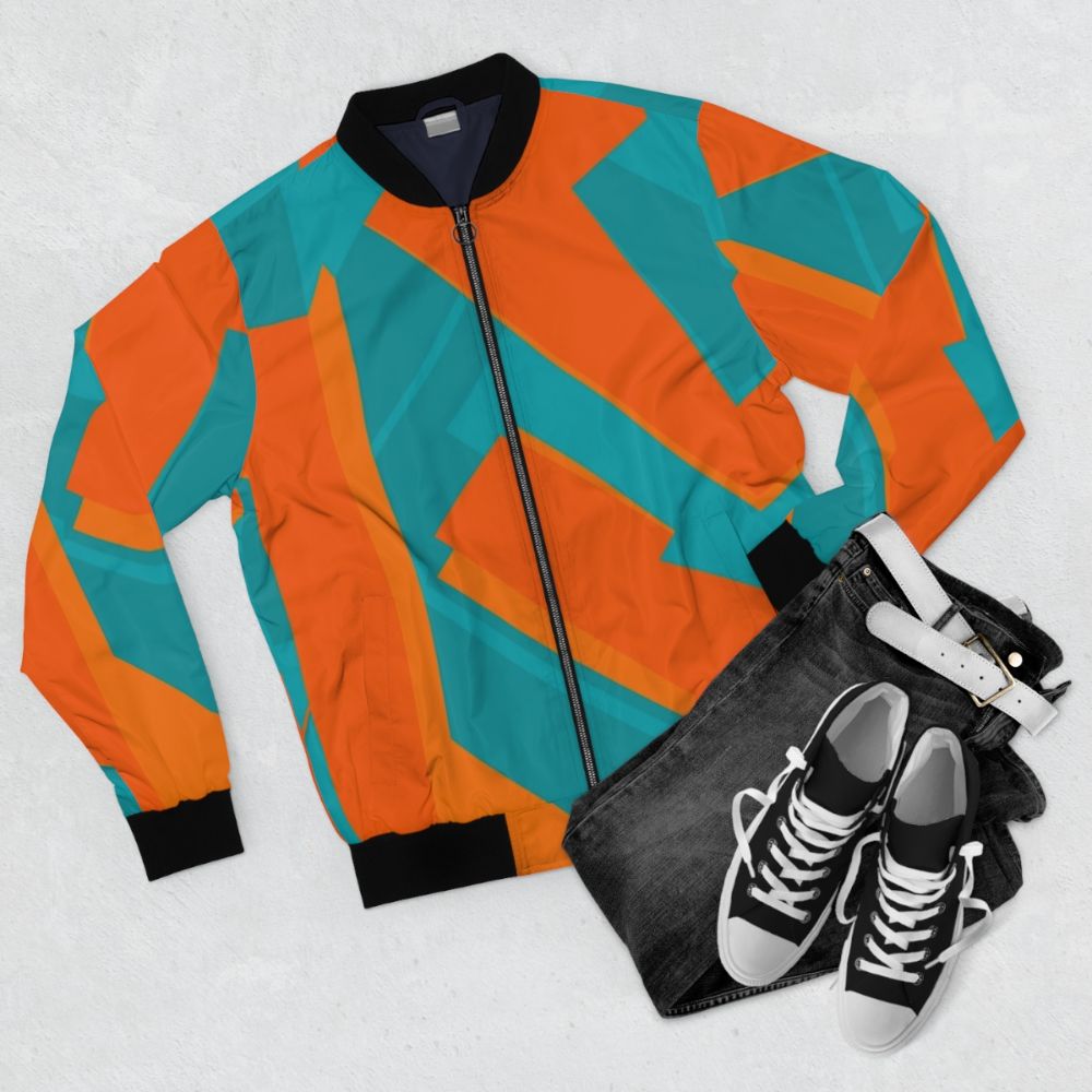 Teal and orange geometric abstract art bomber jacket - Flat lay