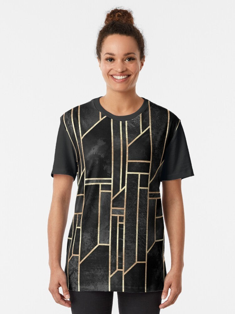 Black graphic t-shirt with abstract geometric pattern in gold and dark colors - Women