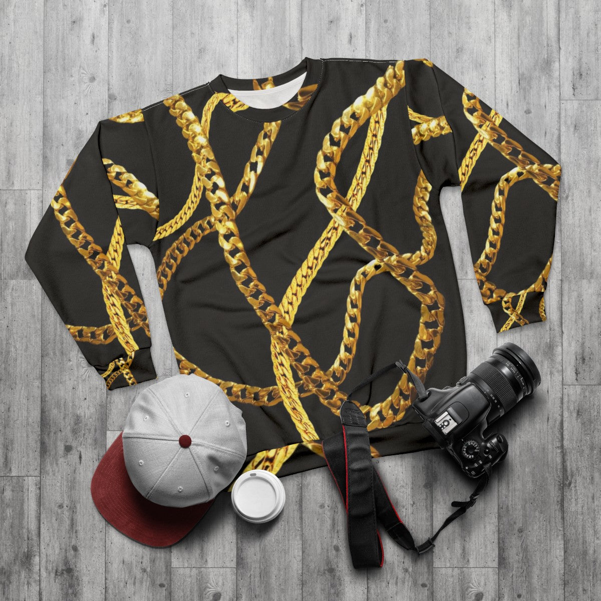 Stylish gold chains sweatshirt for a bold, luxurious look - flat lay