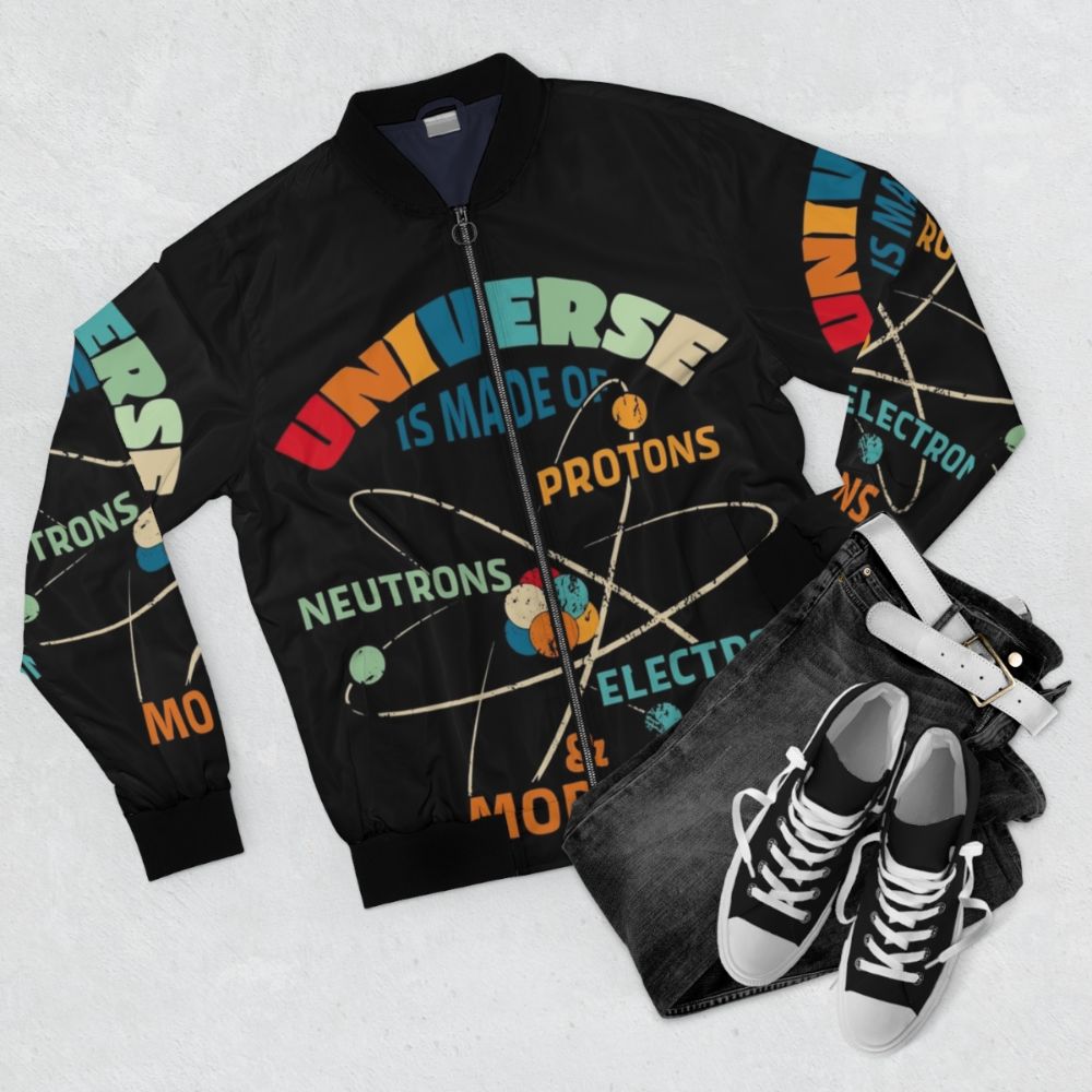 Bomber jacket featuring periodic table elements and science humor puns - Flat lay