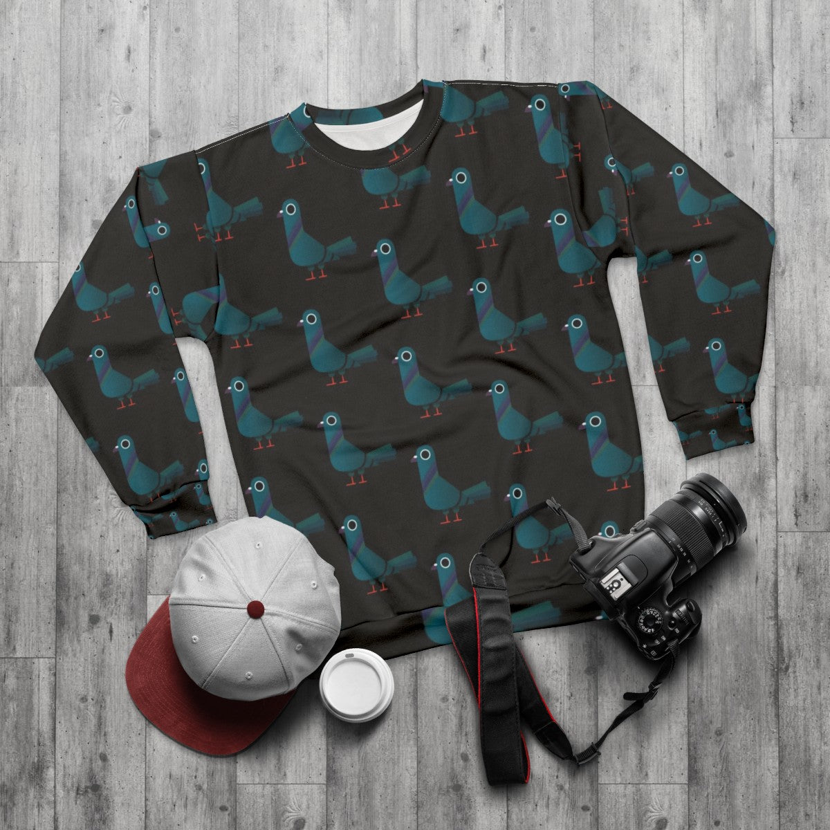 Colorful pigeon sweatshirt with a graphic design - flat lay