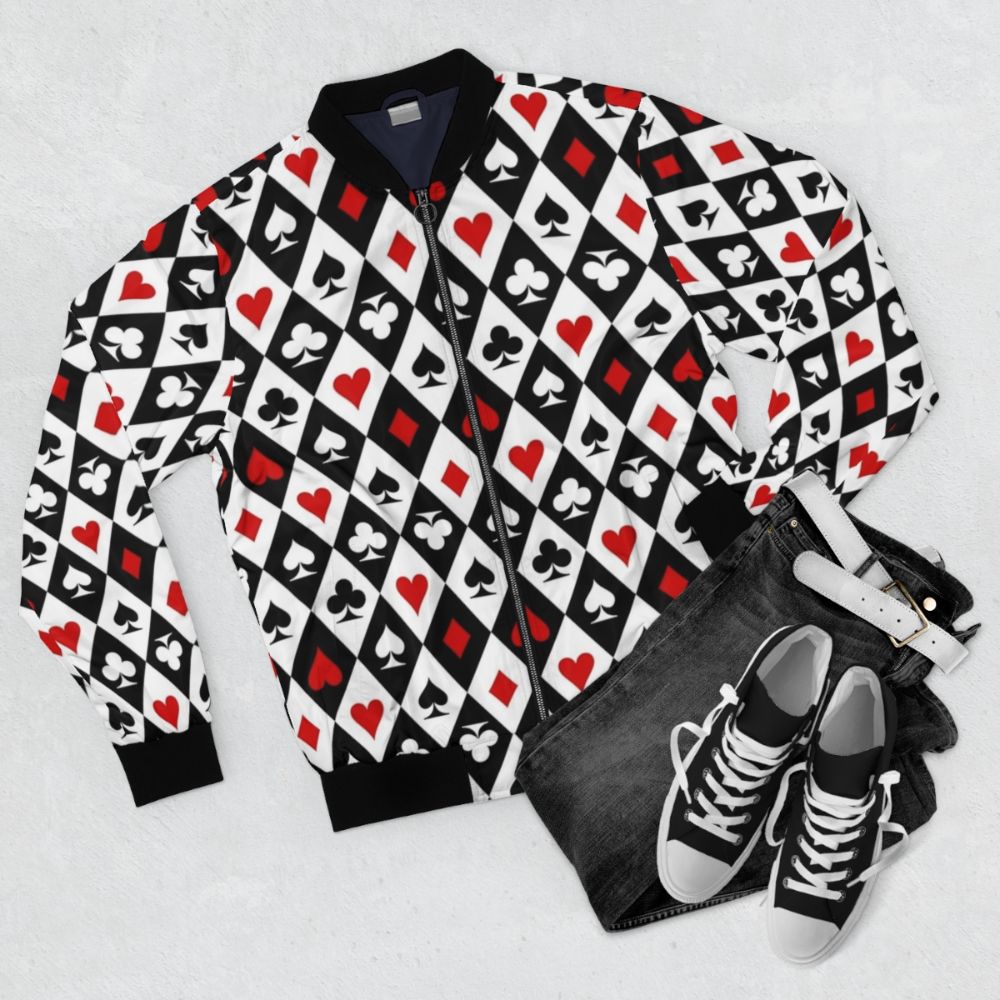 Black and white bomber jacket with playing card suit symbols - Flat lay