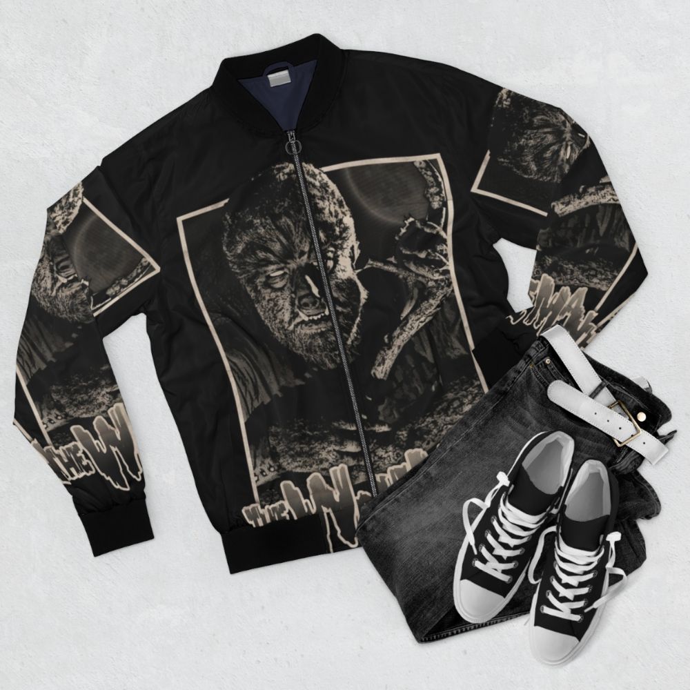 A vintage-inspired bomber jacket featuring a wolfman or werewolf design. - Flat lay