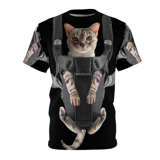 Adorable cat snuggled in a baby carrier on a gray t-shirt