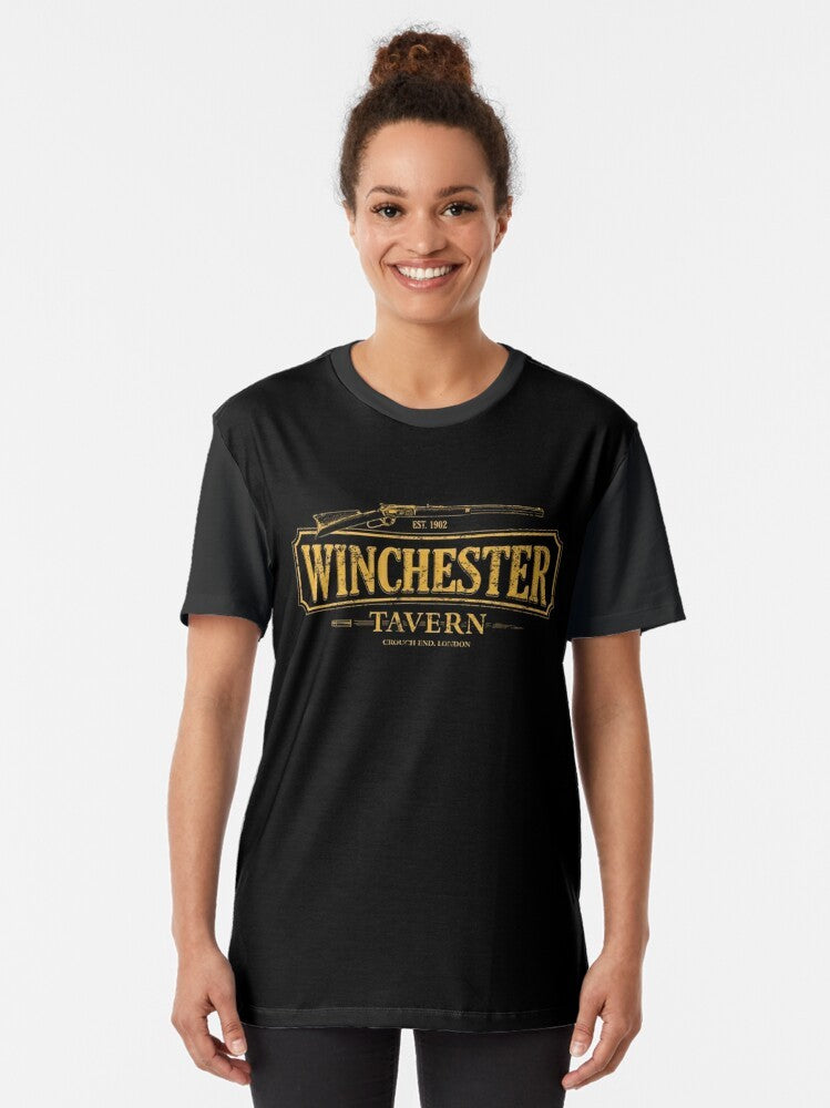 Winchester Tavern Shaun Of The Dead Graphic T-Shirt featuring the iconic movie characters and a zombie attack scene - Women