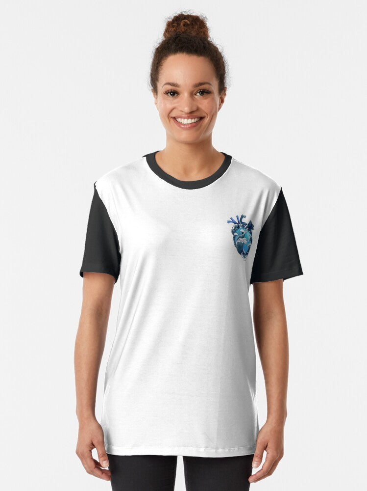 Graphic t-shirt with an anatomical heart design surrounded by ocean waves and underwater scenery - Women