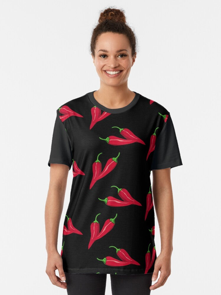 Vibrant red chili peppers in a modern, asymmetric pattern on a black background - Women