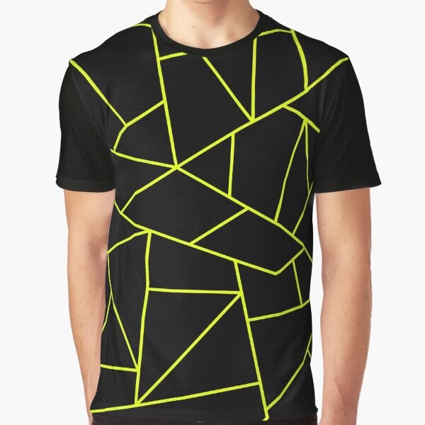 Chartreuse yellow geometric pattern design on a black graphic t-shirt