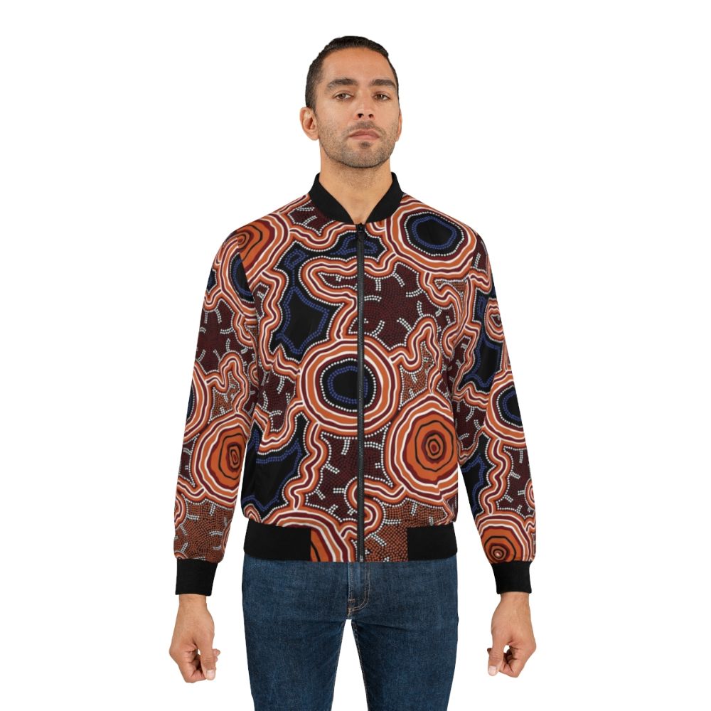 Authentic Aboriginal Art Bomber Jacket with Pathways to Water Design - Lifestyle