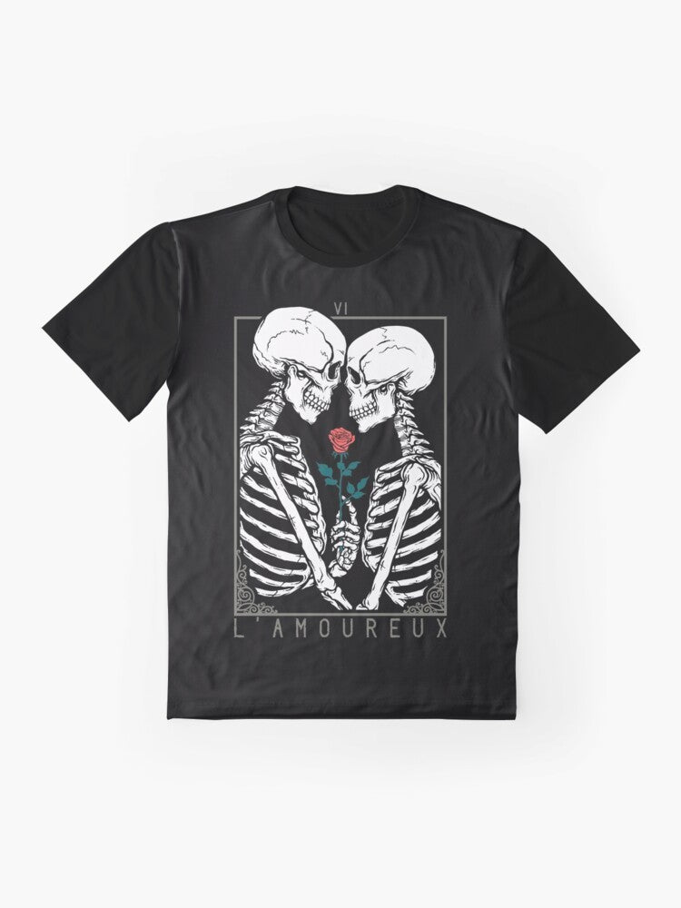 The Lovers tarot card graphic design with skulls, flowers, and a couple kissing on a gothic t-shirt. - Flat lay