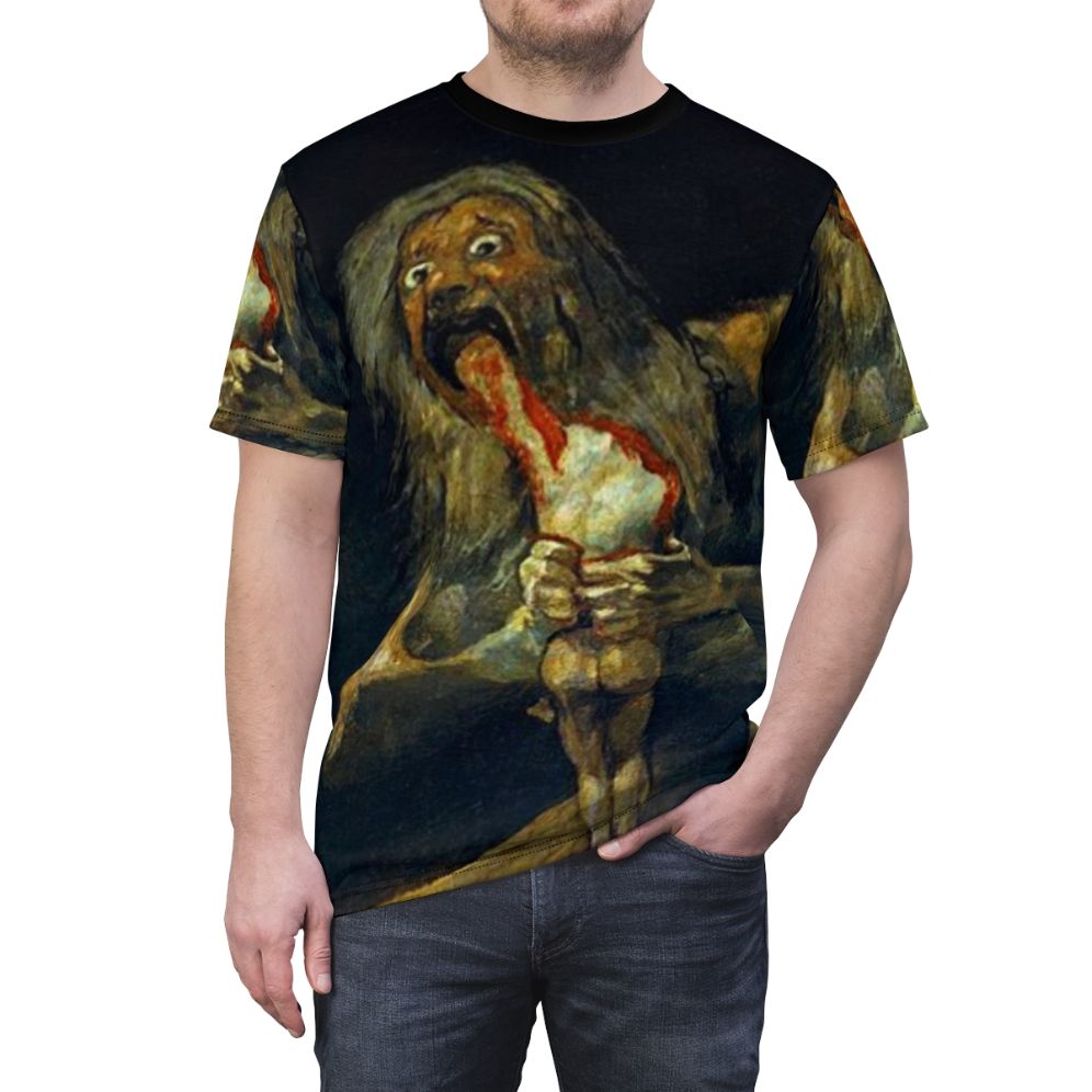 Vintage-style graphic tee featuring Francisco Goya's iconic painting "Saturn Devouring His Son". - men front