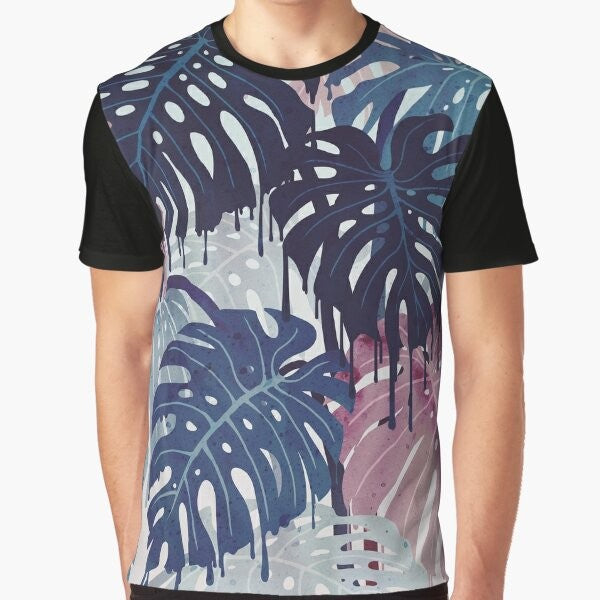 Monstera Melt Graphic T-Shirt featuring a surreal, melting tropical leaf design in blue and pink