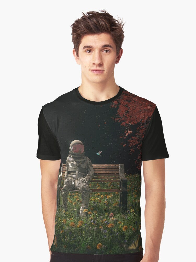 Surreal graphic t-shirt featuring an astronaut in a cosmic, nature-inspired landscape - Men