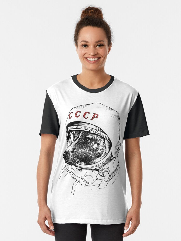 Graphic t-shirt featuring Laika, the famous Soviet space dog, in a space suit and stars - Women