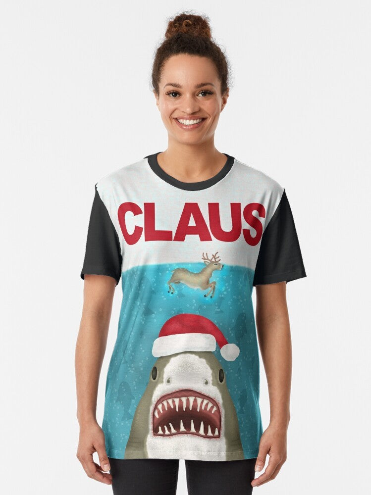 A funny graphic t-shirt featuring a Santa Claus shark with reindeer horns, a humorous Christmas and holiday design. - Women