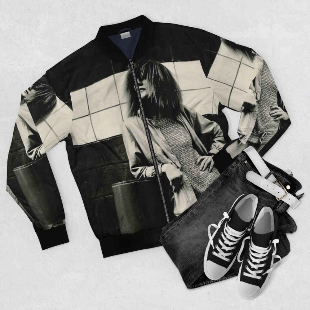 Musique Mecanique Bomber Jacket featuring a design inspired by musician Carla Bley - Flat lay