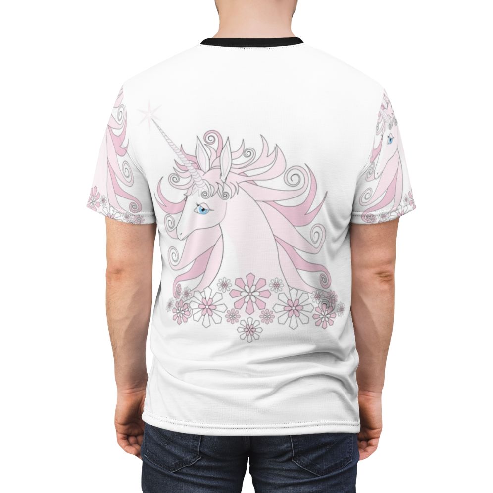 A whimsical t-shirt featuring a beautiful pink unicorn in a fantasy landscape - men back