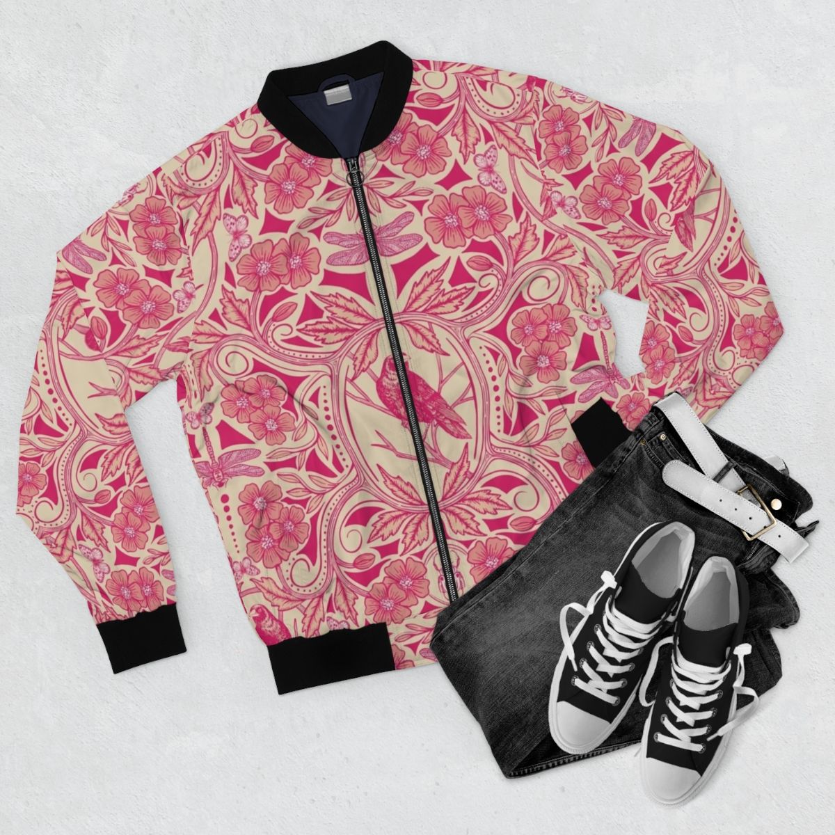 Vibrant floral bomber jacket featuring a detailed crow and dragonfly design in hot pink, red, and cream colors. - Flat lay