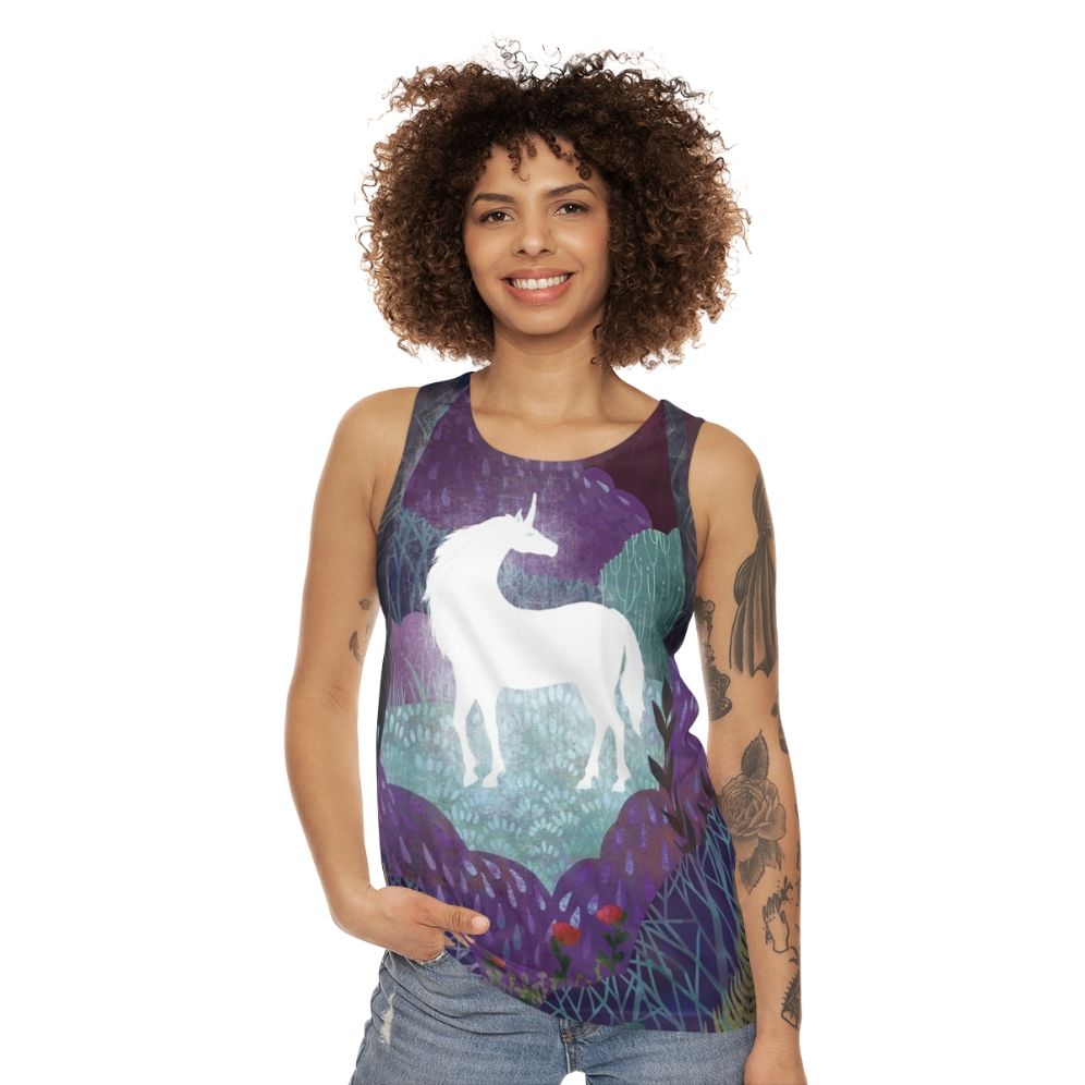 The Last Unicorn Unisex Tank Top featuring a magical unicorn in a fantasy forest - women