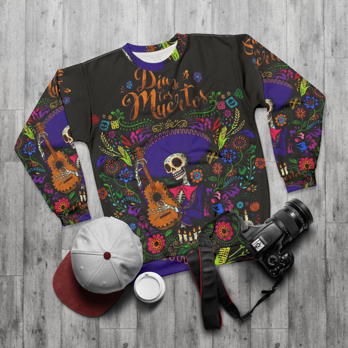 Dia De Los Muertos Sweatshirt featuring a sugar skull design - flat lay