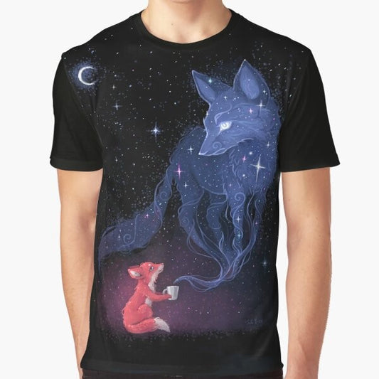 Celestial graphic t-shirt featuring a cute fox character surrounded by stars, moons, and cosmic elements